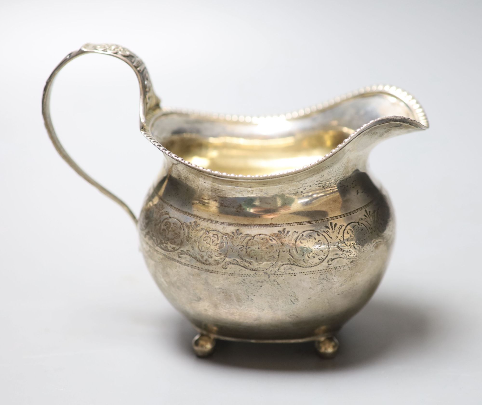 A George III silver cream jug, London, 1817, maker Andrew Fogelburg, height 13cm, 6oz.